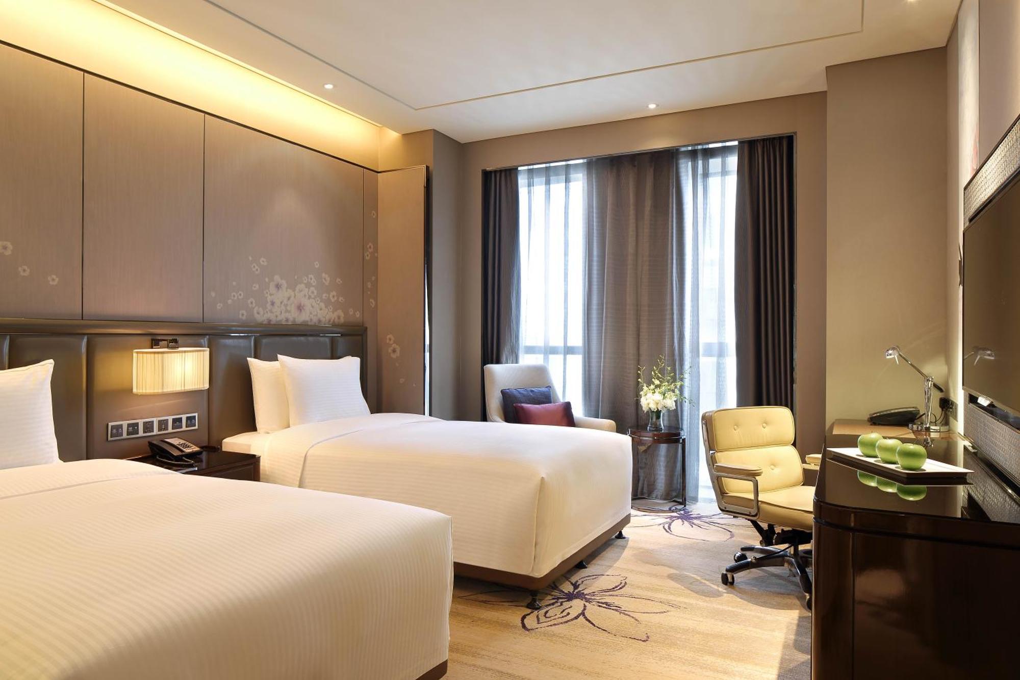 Hotel Wanda Realm Guangyuan Extérieur photo